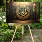 İslami Hat Sanatı Temperli Cam Tablo – “Vel-Vâlideyn” (Anne ve Babaya Hürmet, Nisa 36 / Bakara 83) Siyah & Altın Lüks Dini Dekor